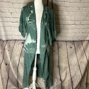 Rebellion sheer long cardigan.no closure. Teal color, size medium